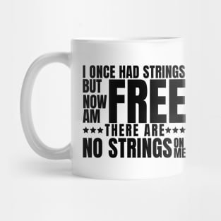 I once had strings but now am free, there are no strings on me Mug